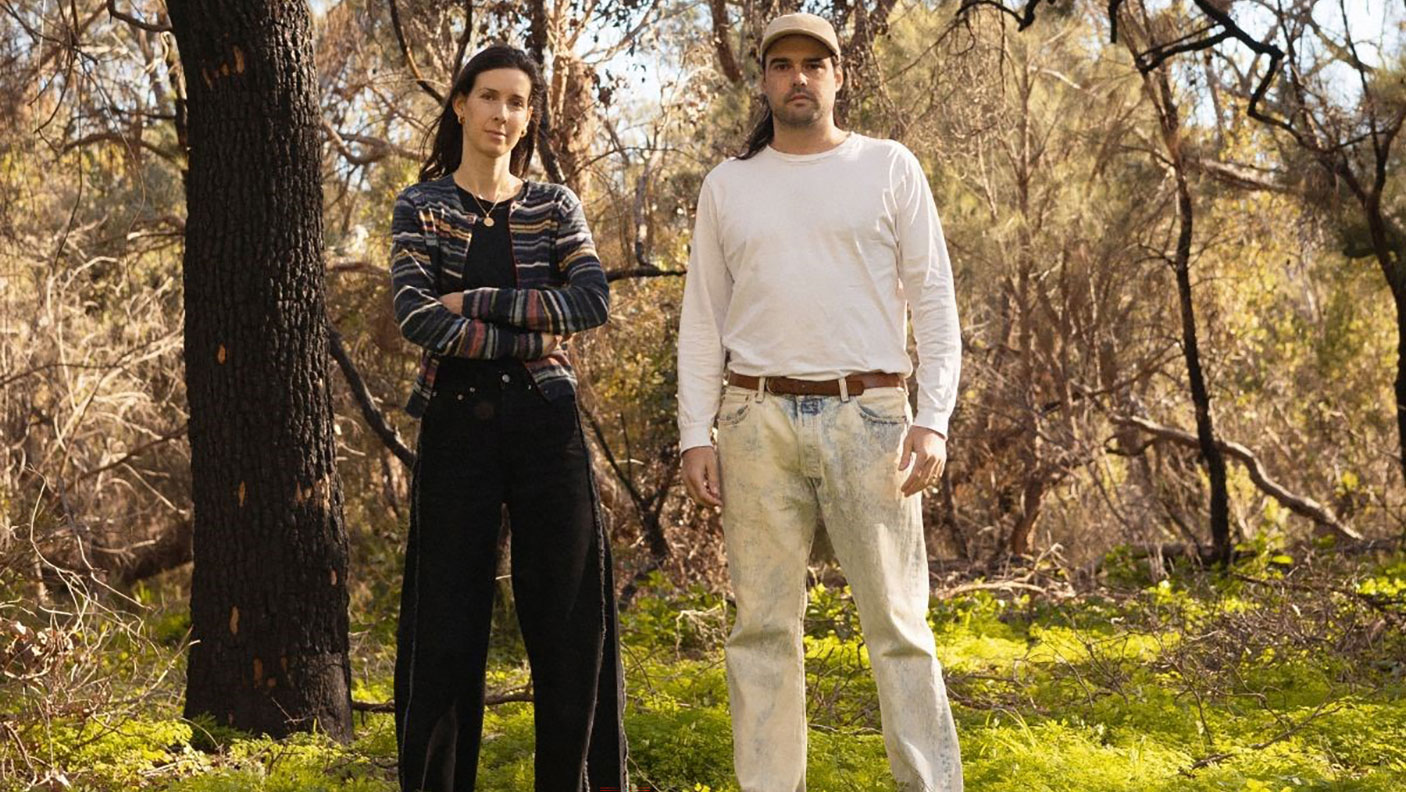 Actors Melanie Filler and Tim Barretto stand in the Australian bush