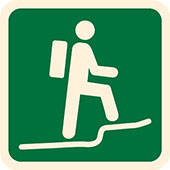 Symbol for Australian Walking Track Grade 4: figure with a backpack hikes a path with a step and incline.