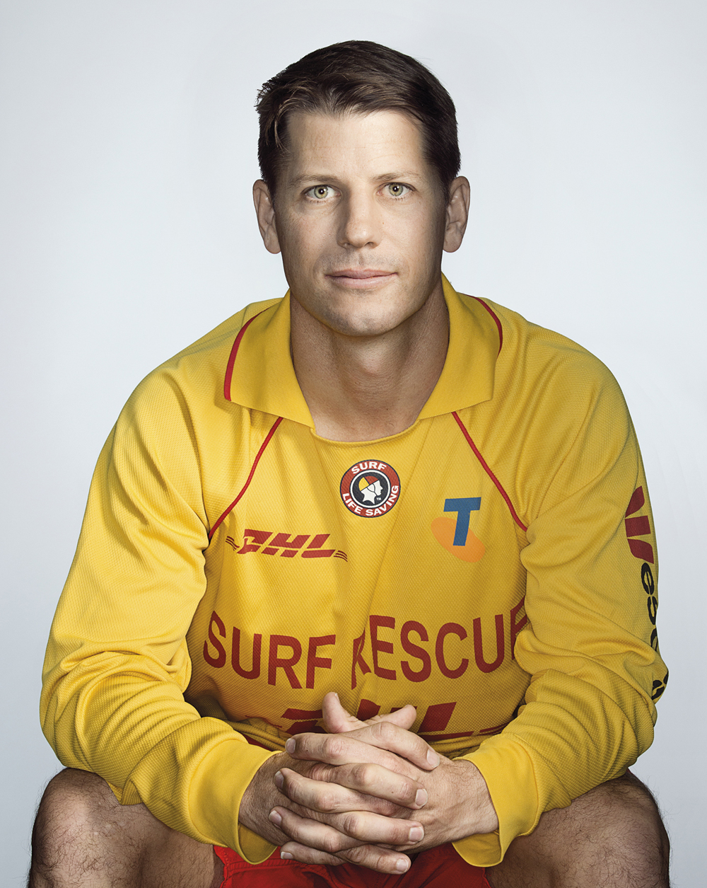 Portrait of Kim Wallis in his surf lifesaving unifrom