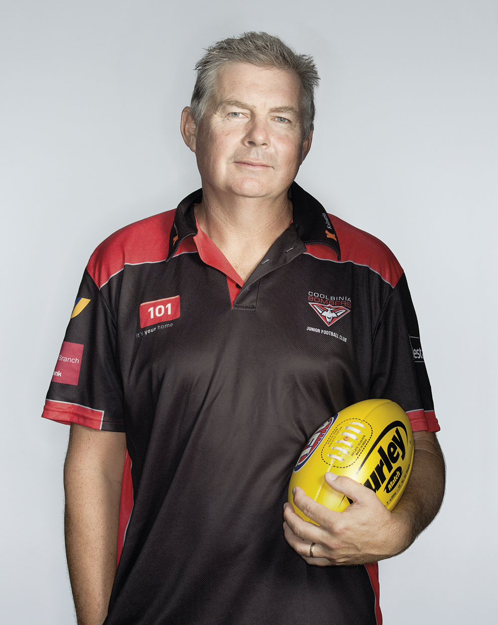 Portrait of Rob Geersen holding a football