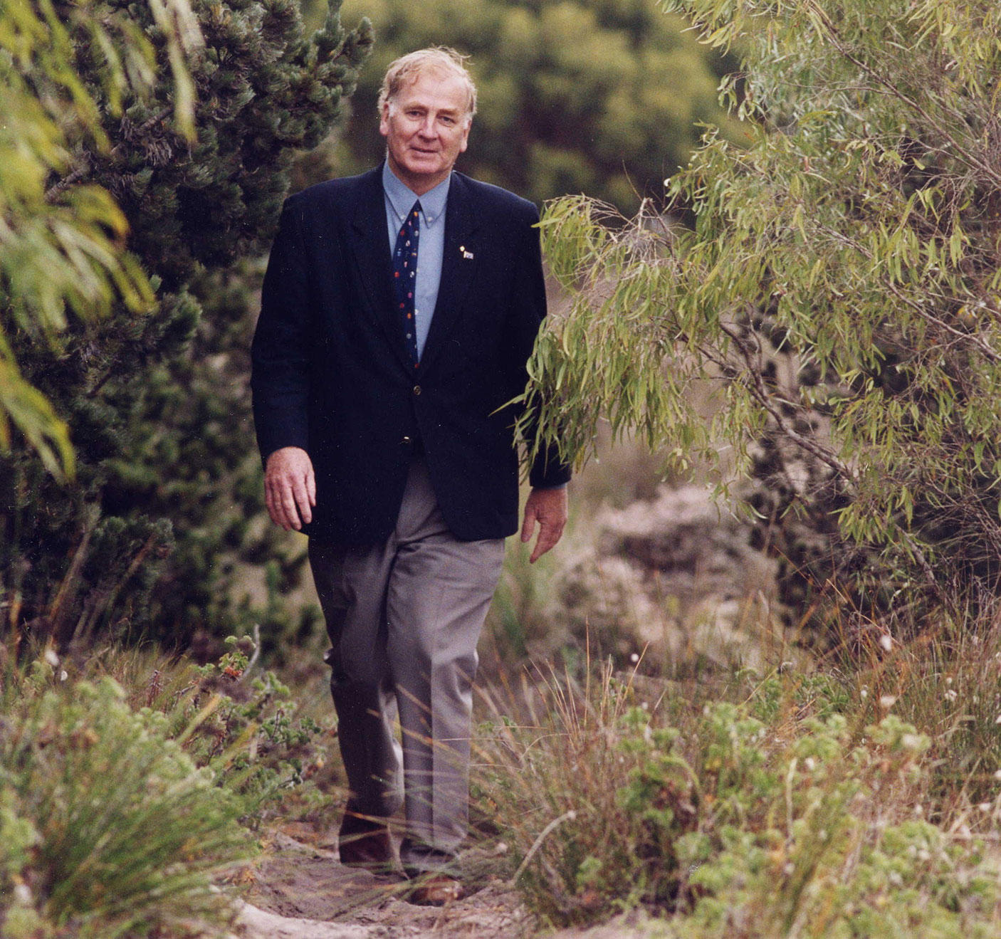 Historical photograph of Mike Stidwell in a bushland setting