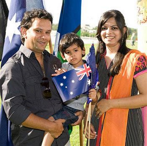 A couple and thir child at a citizenship ceremony